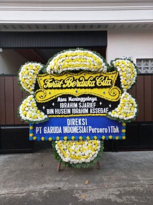 Papan Bunga Duka di Mbua Tengah